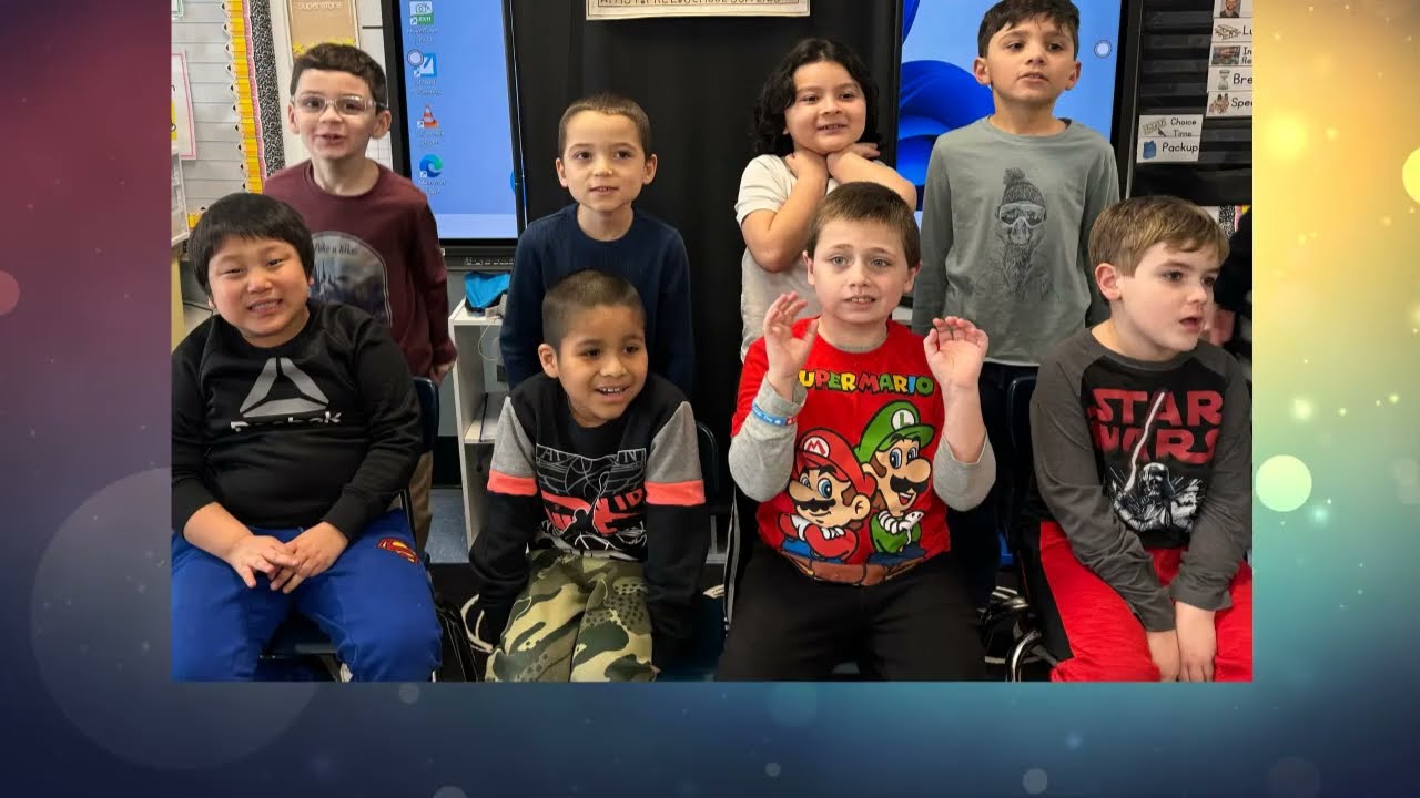 Video preview image of Students dressed as amazon prime workers delivering office supplies; click to visit the ParentSquare post with the video