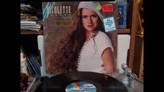 Nicolette Larson building bridges 