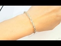 TIFFANY &amp; CO. STERLING SILVER 18 KARAT YELLOW GOLD ROPE BRACELET