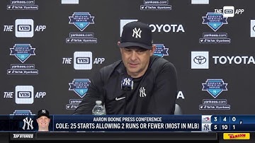 Aaron Boone applauds Gerrit Cole following his outing against the Blue Jays