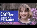 Amputee learns to dance