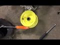 How to change a tire on a John Deere