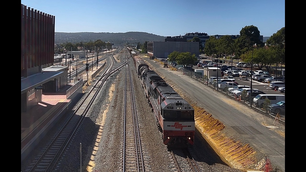 Positioned around Midland station for the opening day, with passing 5MP9 SCT intermodal.