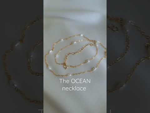 Gold pearl necklace,