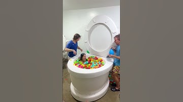 My EX BOYFRIENDS Pranked Me with Water Balloons in the Worlds Largest Toilet Play Balls #shorts