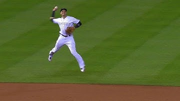 MIN@COL: Tulowitzki makes outstanding jumping throw