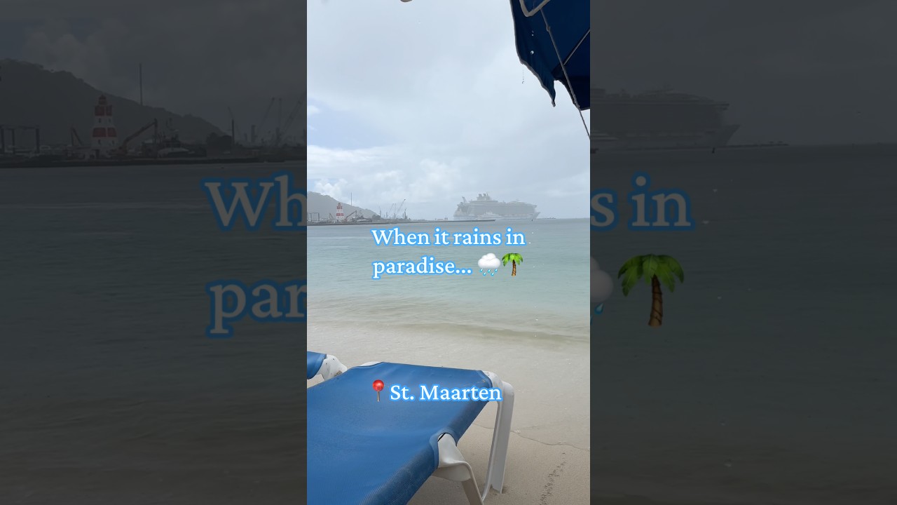 Rain on a Caribbean beach? We still go swimming! 🌧️🌊 #shorts #stmaarten #travelfail #cruiselife