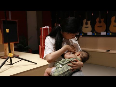 False ads, bad advice puts China's mums off breastfeeding | AFP