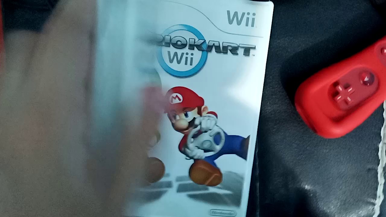 Como insertar un disco en la wii - YouTube