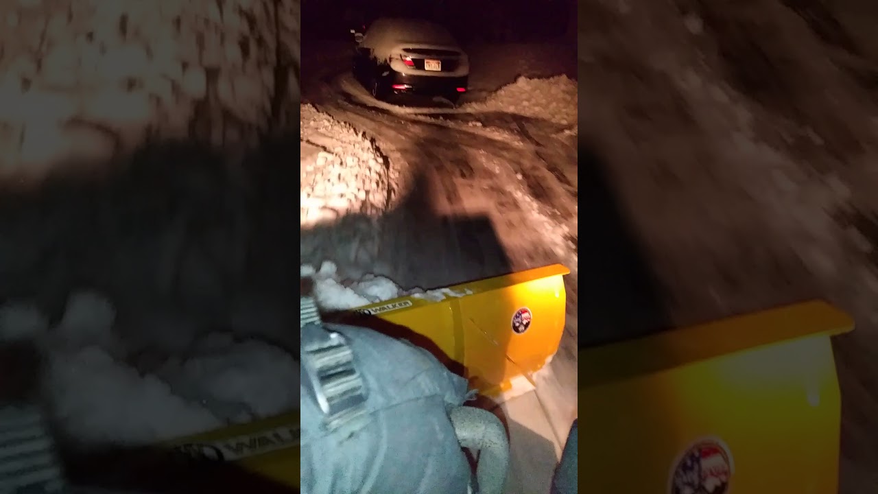 Plowing snow with a walker mower 1 