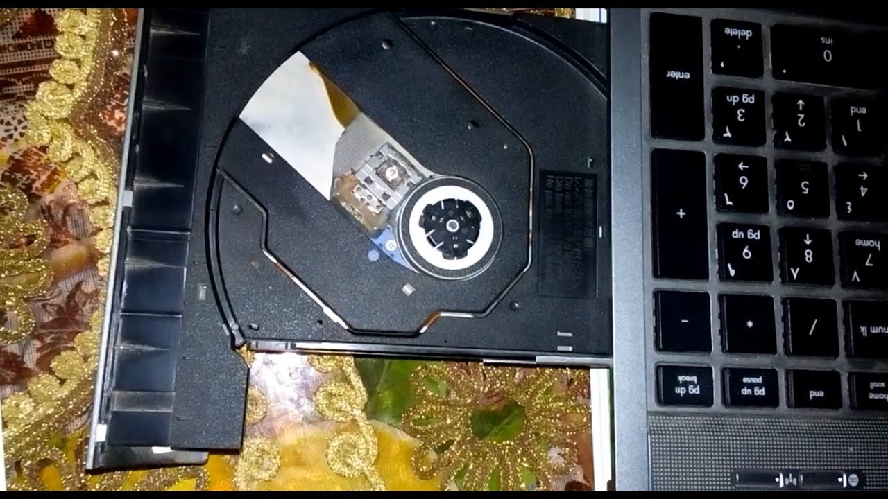 how to open cd drive on hp laptop