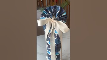 How to Wrap a Bottle 🍾#giftwrapping #giftwrappingideas  #giftwrappinghacks #diy #howto #shorts