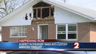 Suspect in standoff taken into custody