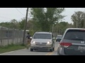 Guy skating on an oncoming traffic