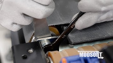 Divert Belt Tension Adjustment on the System Plast® Modsort® Transfer and Divert Module.