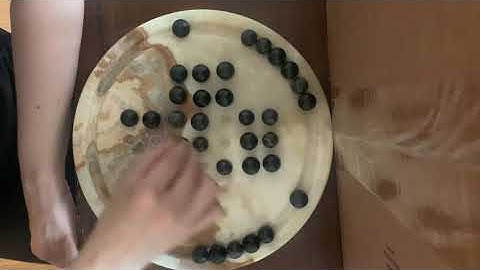 The English Board (solitaire solution)