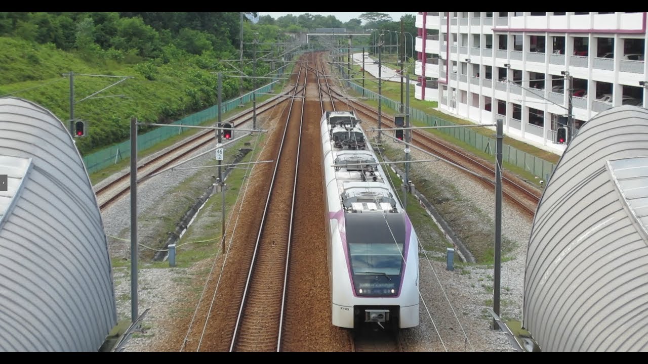 KLIA Transit trains at Salak Tinggi ERL Station. Passenger ...