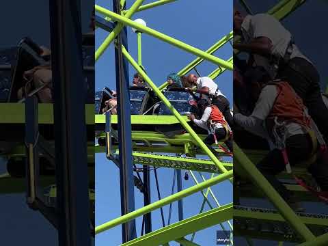 Stranded roller coaster car pushed down the tracks by ride operators #Shorts