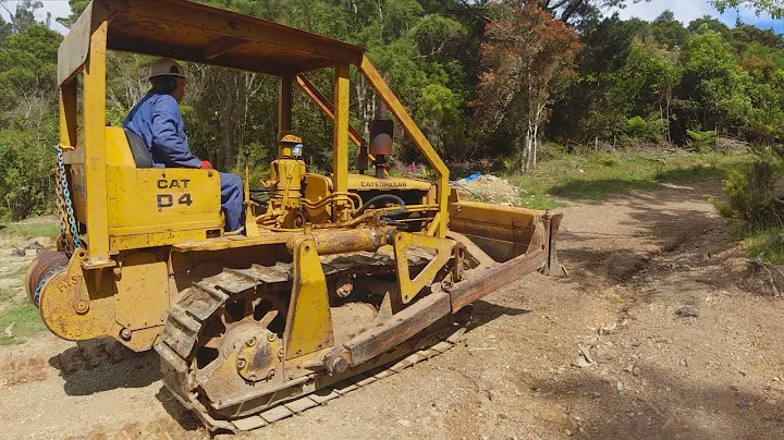 Fixing a broken clutch on a Cat D4 7U Bulldozer