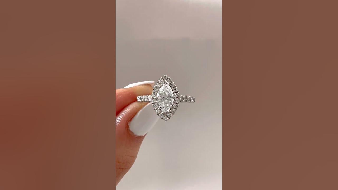 Elevate Your Love Story with our Customized Halo Marquise Diamond Ring.