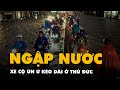 Đường Phạm Văn Đồng ở TP Thủ Đức ngập cục bộ, xe cộ ùn ứ kéo dài