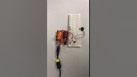 Arduino lab coursework : buzzer and LED as output with pushbutton switch