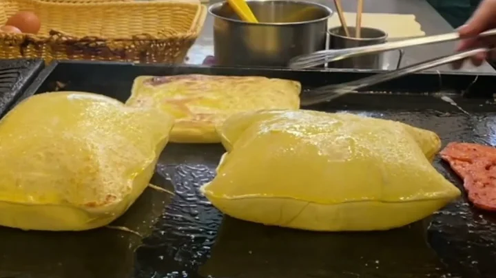 Freshly baked and egg-stuffed, the pancake aroma is adorable.