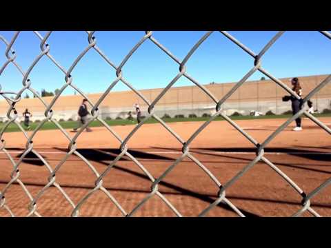 Corissa Sweet Firecrackers 03 triple to the fence to drive in a run