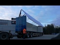 Seinänouseva ketjupurkuvaunu / chain conveyor trailer with wall lifter