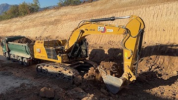 Brand New Cat 352 Digger Working On A Road Construction Project With Fleet Of Trucks - Interkat SA