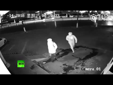 Dumbest burglars ever? Surveillance footage of failed robbery released by Shanghai police