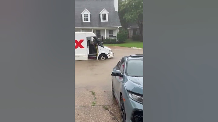 Mississippi Flooding: FedEx Truck Drives Through Flooded Roadway In Brandon