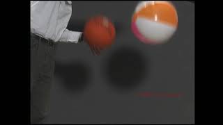 Fall Of A Basketball And A Beach Ball