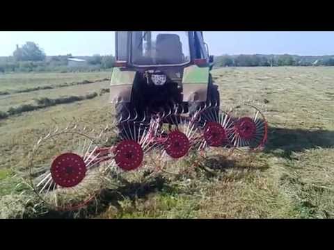 Видео: Тракторни гребла за приготвяне на сено