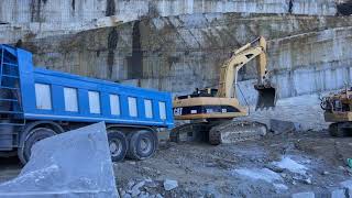 4K - CAT 330C LME loading BIG ROCKS on IVECO T-WAY 510