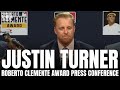 Justin turner reacts to winning 2022 roberto clemente award with robert clementes family