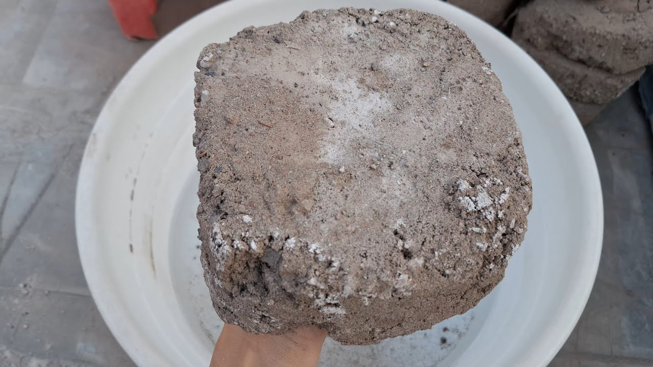 New video Brown stony sand water crumbling satisfying