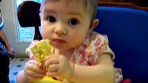 PAIGE EATING CORN