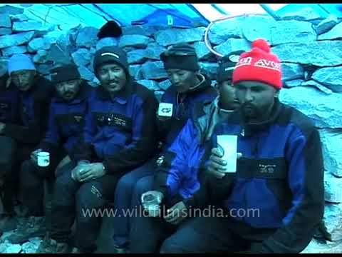 Russian team member giving a byte at 8,000 ft, Pumori Nepal