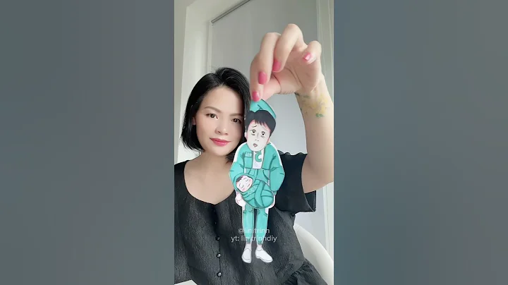 Squid Game 3 Hanging Paper Player 456 with the baby