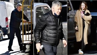 Alec Baldwin gets in his car with wife Hilaria Baldwin to leave town.