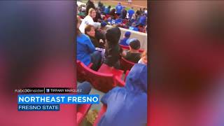 Valley softball fans sing national anthem unaccompanied