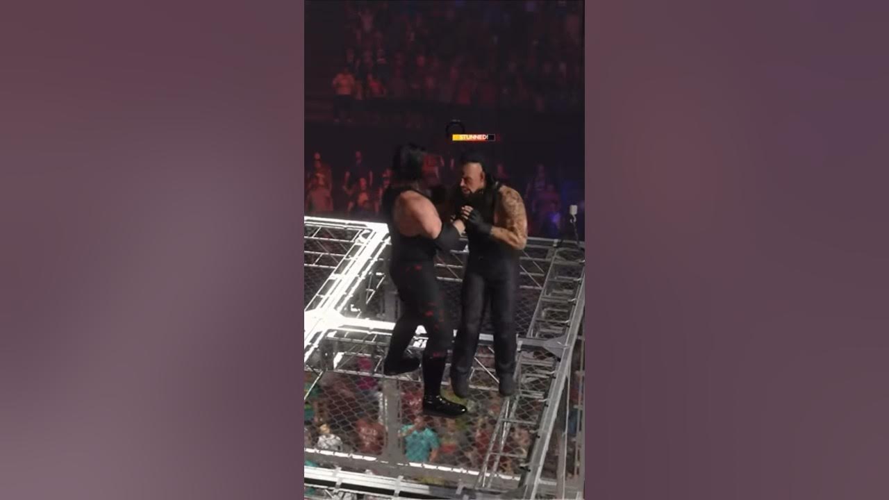 WWE 2K23 KANE CHOKE SLAMS UNDERTAKER OFF HELL IN A CELL AND THROUGH A