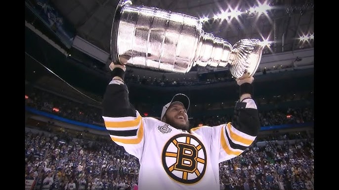 prompthunt: patrice bergeron holding the stanley cup boston bruins