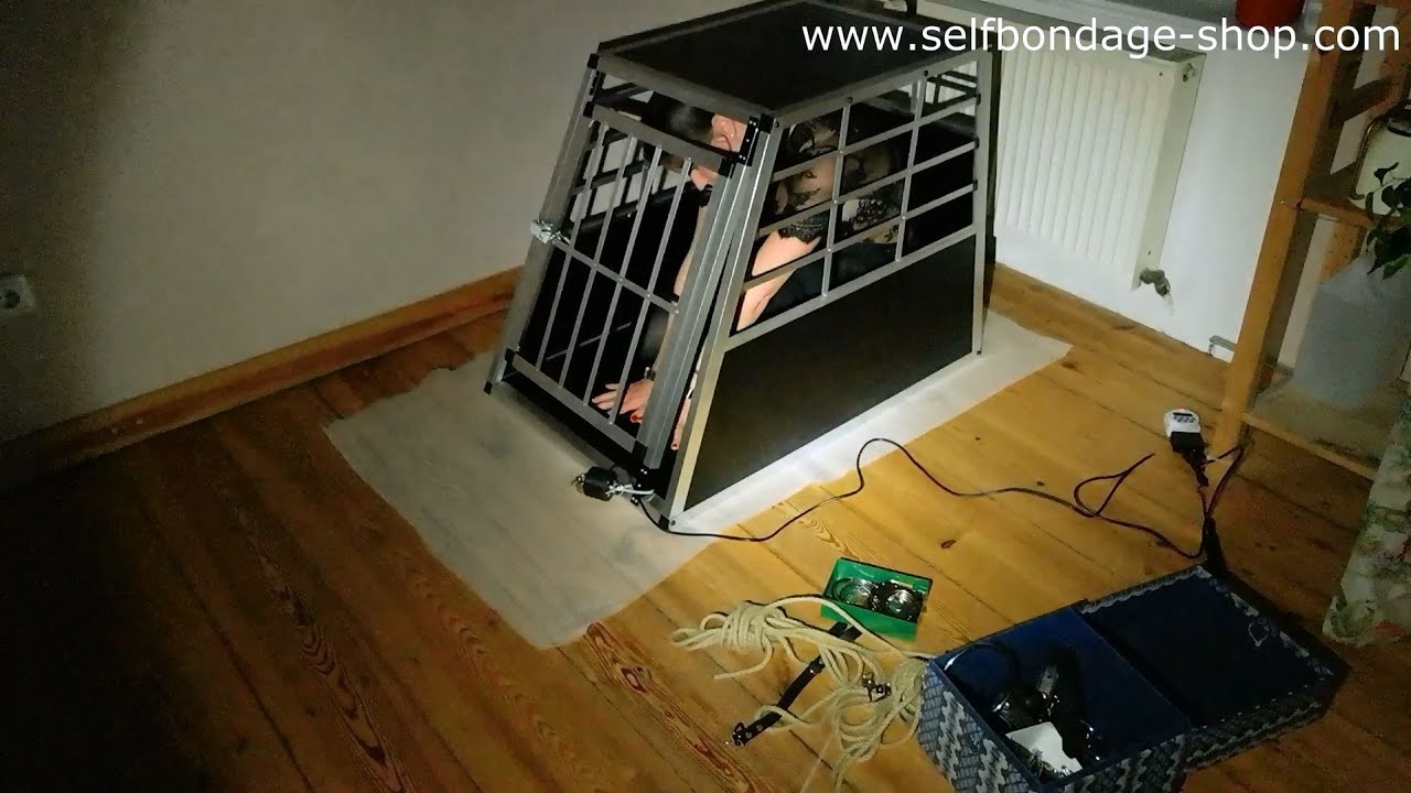 Download Girl caught during self-bondage session in a cage
