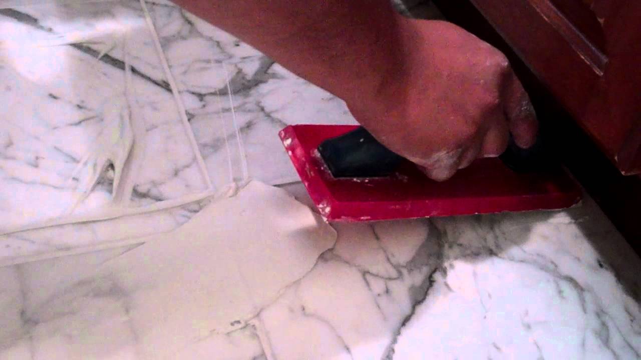 How to regrouting a marble foor applying the grout YouTube