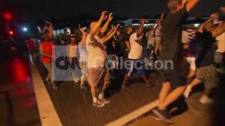 FERGUSON SHOOTING:PROTESTERS MARCH IN THE RAIN
