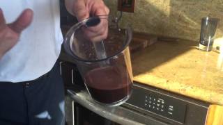 Morning Juice!  Pomegranate, Ginger, Lemon, blueberries and Dandelion Greens.