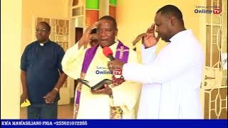 TAZAMA MWILI WA MHE. PADRE JOHN A. KIWERE UKIINGIZWA KANISANI MWENGE