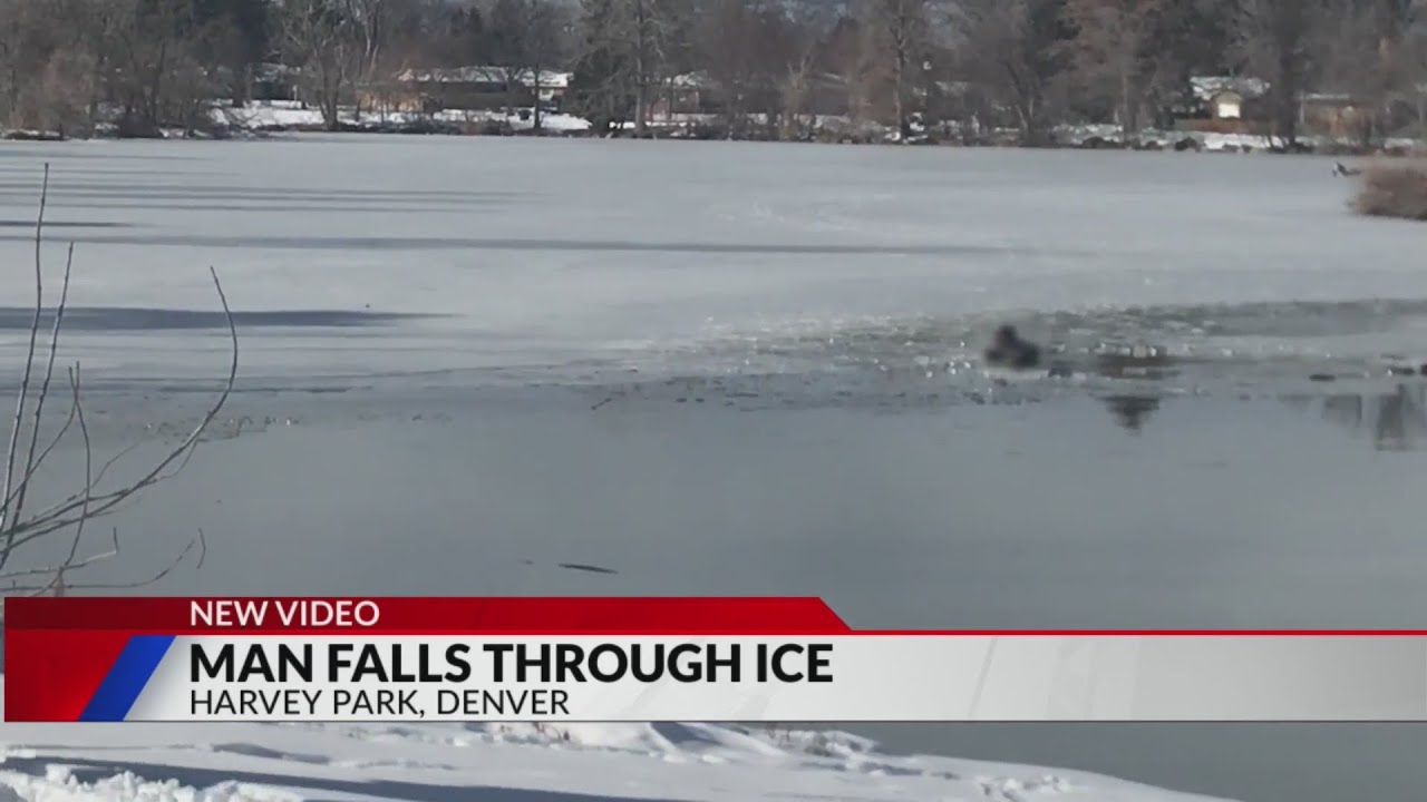 Man rescued by Denver Fire after falling through ice - YouTube